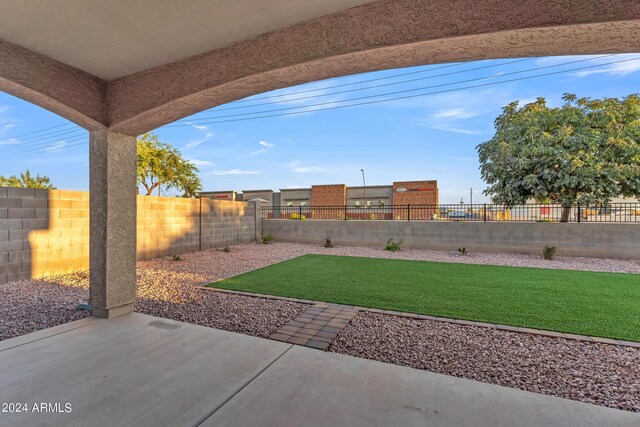 view of yard with a fenced backyard and a patio