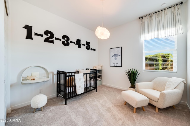 7854 W Tether Trl, Peoria, AZ 85383 - bedroom featuring carpet, a crib, and baseboards