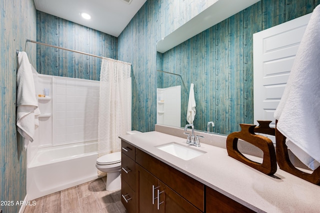 7854 W Tether Trl, Peoria, AZ 85383 - bathroom with wallpapered walls, wood finished floors, shower / tub combo with curtain, vanity, and toilet