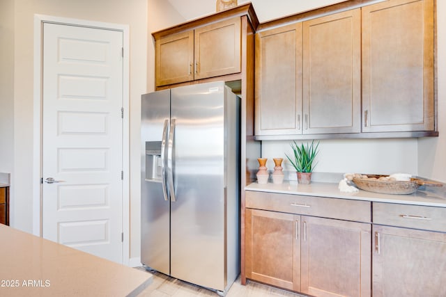 7854 W Tether Trl, Peoria, AZ 85383 - kitchen featuring stainless steel fridge and light countertops