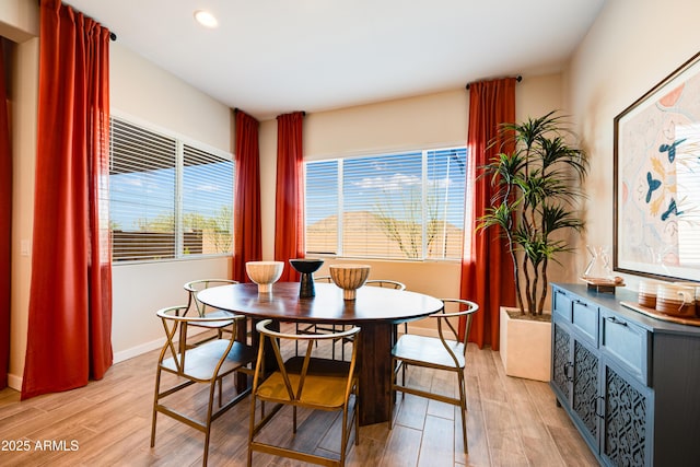 7854 W Tether Trl, Peoria, AZ 85383 - dining space featuring light wood-style floors, baseboards, and recessed lighting