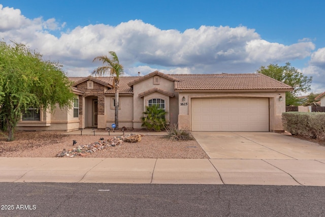 1625 E Clover St, Casa Grande, AZ 85122 - view of front of property with an attached garage, a tile roof, stucco siding, and driveway