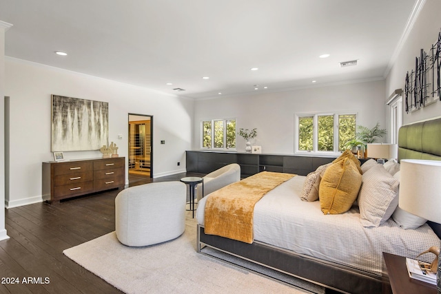 bedroom featuring baseboards, ornamental molding, recessed lighting, visible vents, and dark wood finished floors
