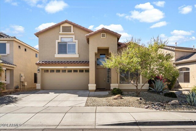 view of front of property featuring a garage