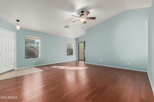 spare room with ceiling fan, wood-type flooring, and lofted ceiling