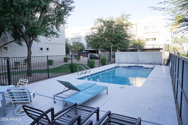 view of pool with a patio area