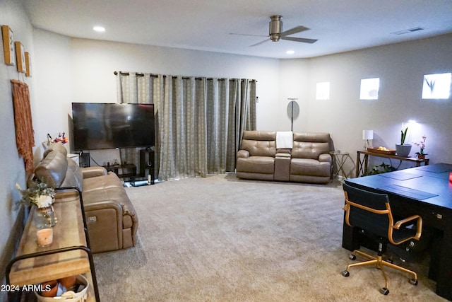 living room with carpet and ceiling fan