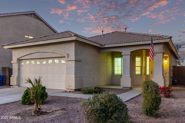 view of front of property with a garage