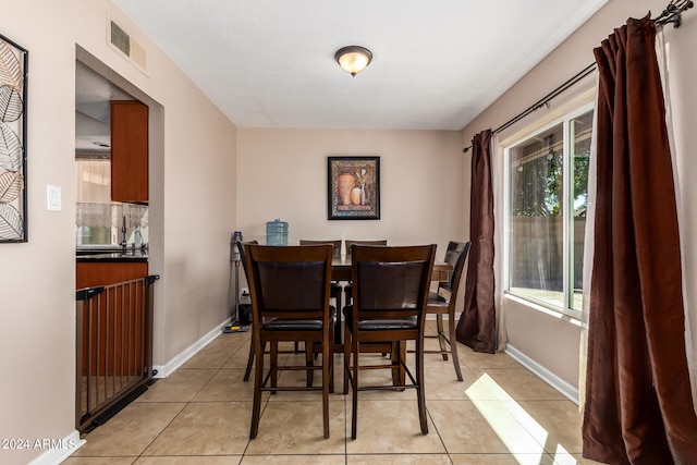 view of tiled dining space