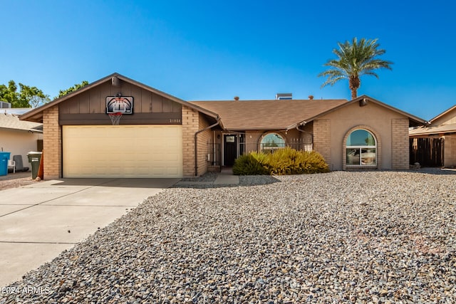 single story home with a garage