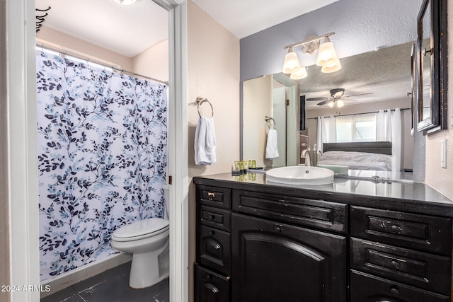 bathroom featuring ceiling fan, vanity, tile patterned floors, a shower with curtain, and toilet