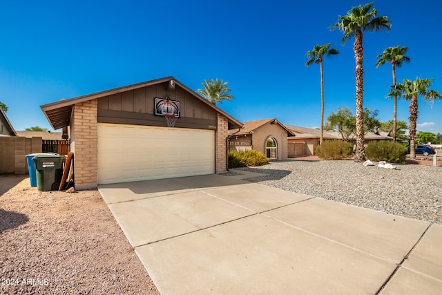 single story home featuring a garage