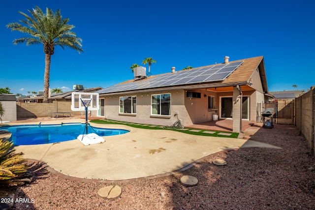 exterior space with grilling area and a patio area