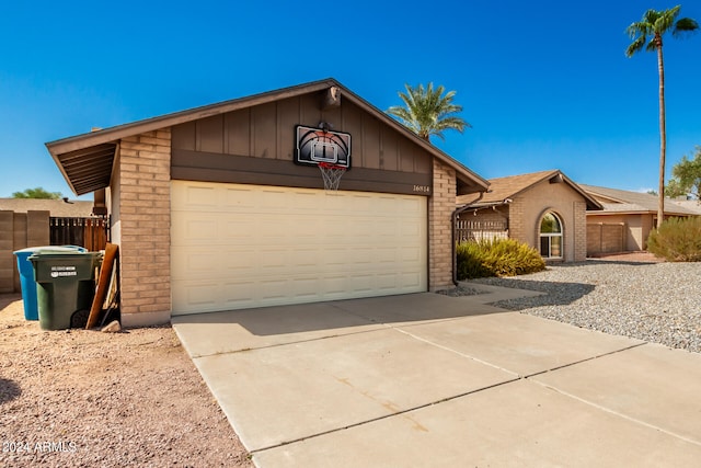 ranch-style home with a garage