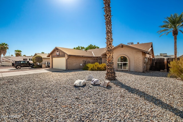 single story home featuring a garage