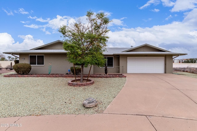 single story home with a garage