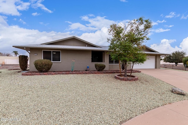 ranch-style house featuring a garage