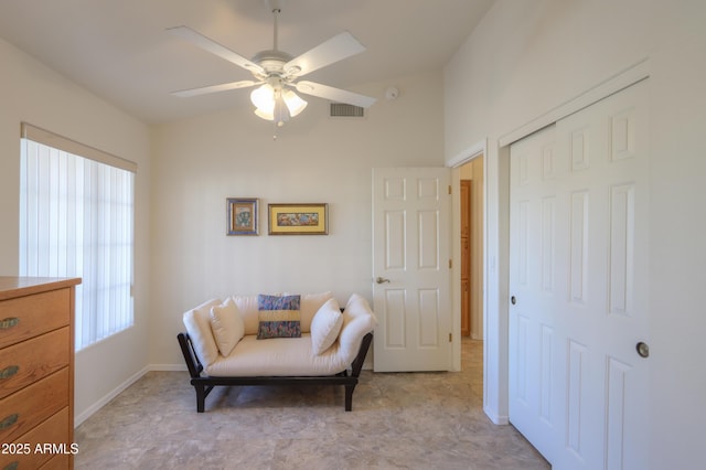 sitting room with ceiling fan