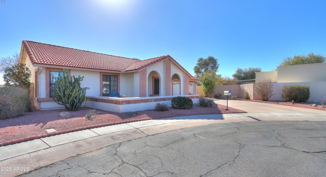 mediterranean / spanish-style house featuring a garage