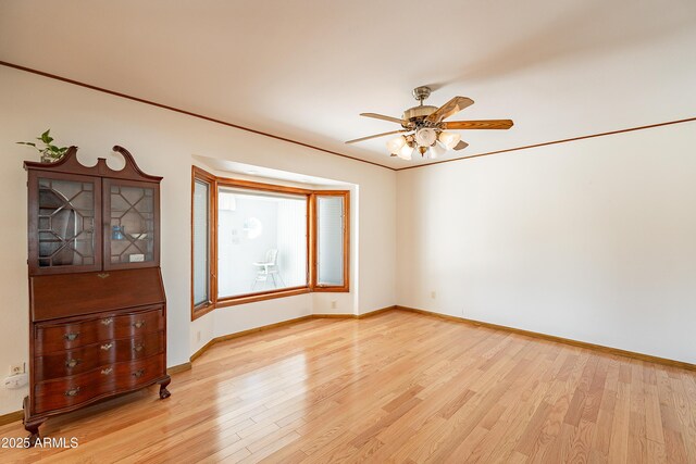 3109 N 81st St, Scottsdale, AZ 85251 - empty room featuring light wood-type flooring, a ceiling fan, and baseboards