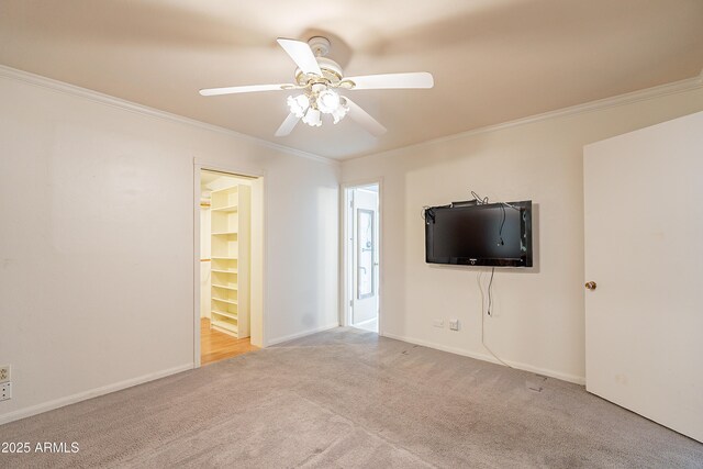 3109 N 81st St, Scottsdale, AZ 85251 - unfurnished living room featuring ornamental molding, carpet floors, a ceiling fan, and baseboards