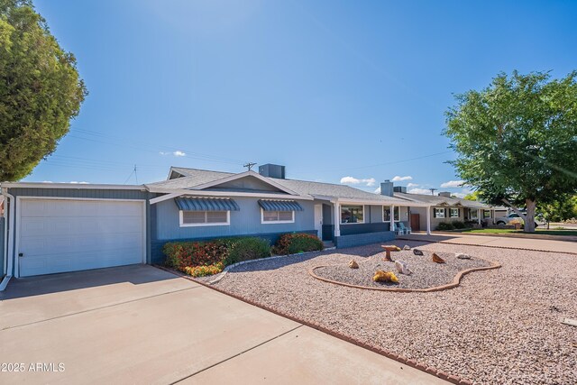 3109 N 81st St, Scottsdale, AZ 85251 - ranch-style house featuring an attached garage and concrete driveway