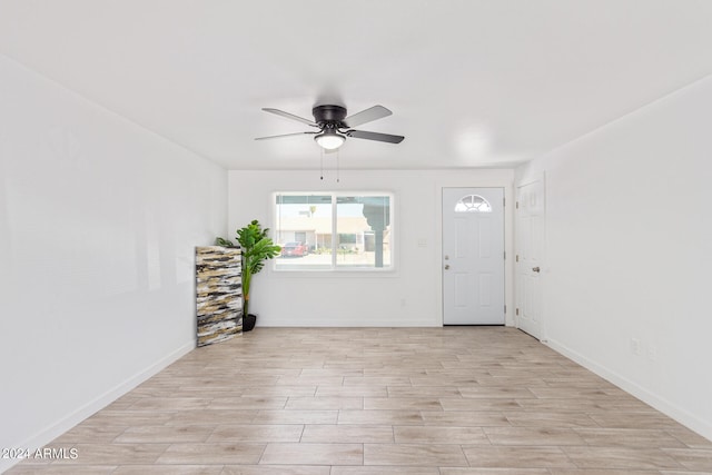 entryway featuring light wood-type flooring and ceiling fan