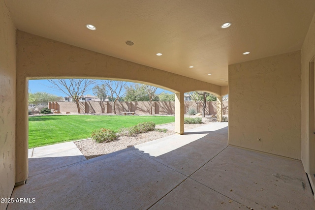 view of patio / terrace featuring fence