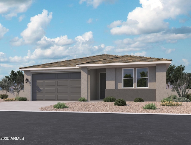 view of front of home featuring a garage, stucco siding, and concrete driveway