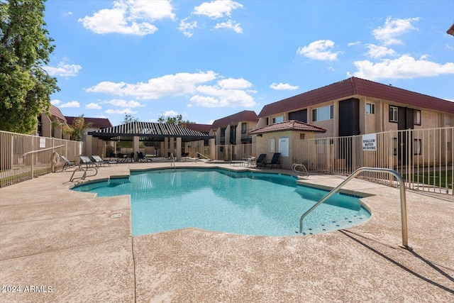 view of pool featuring a patio area