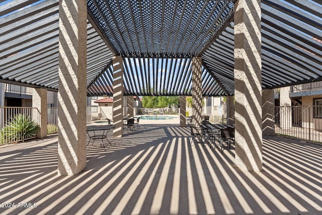 view of patio with a community pool