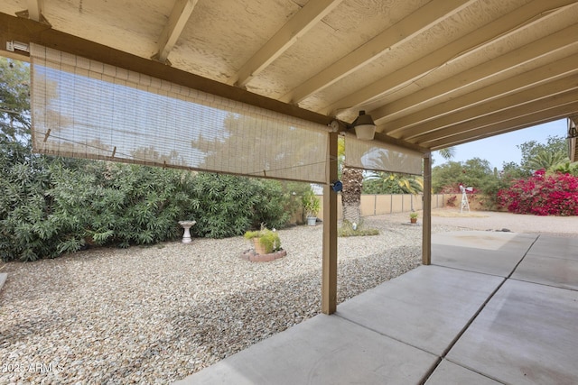 view of patio / terrace with fence