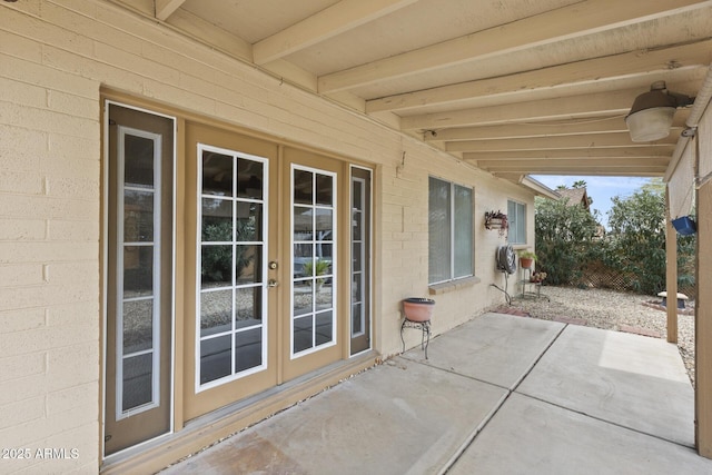 view of patio featuring french doors