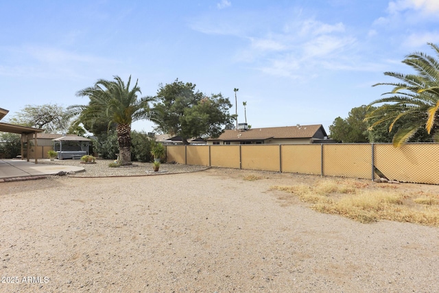 view of yard with fence