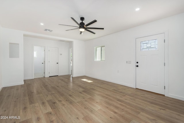 unfurnished bedroom featuring dark colored carpet and ceiling fan