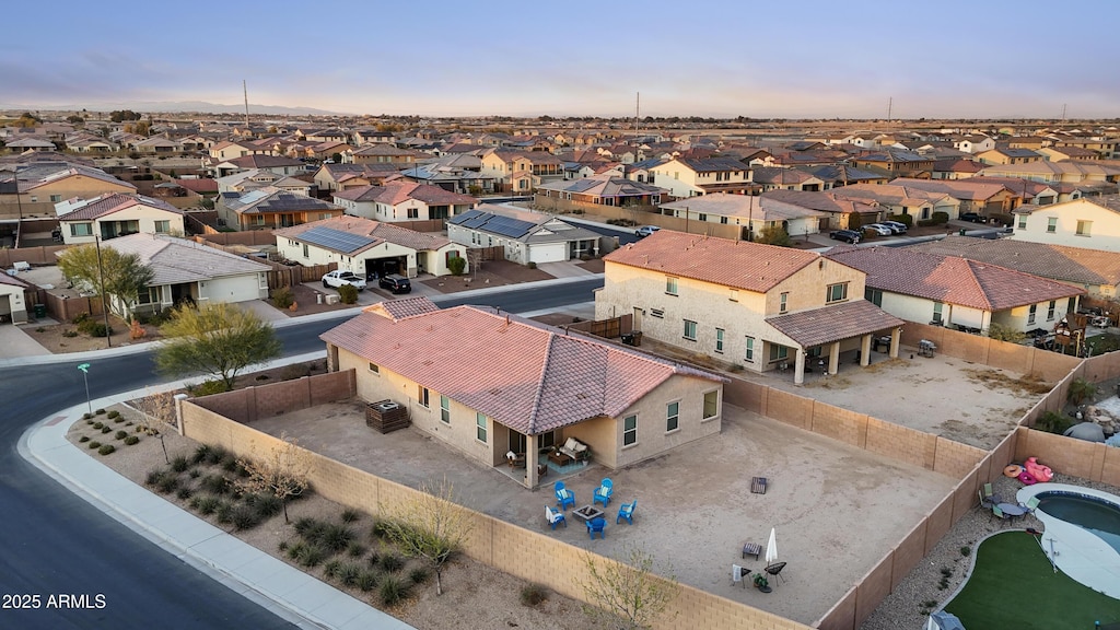 aerial view at dusk with a residential view