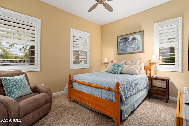 bedroom with carpet flooring, ceiling fan, and baseboards