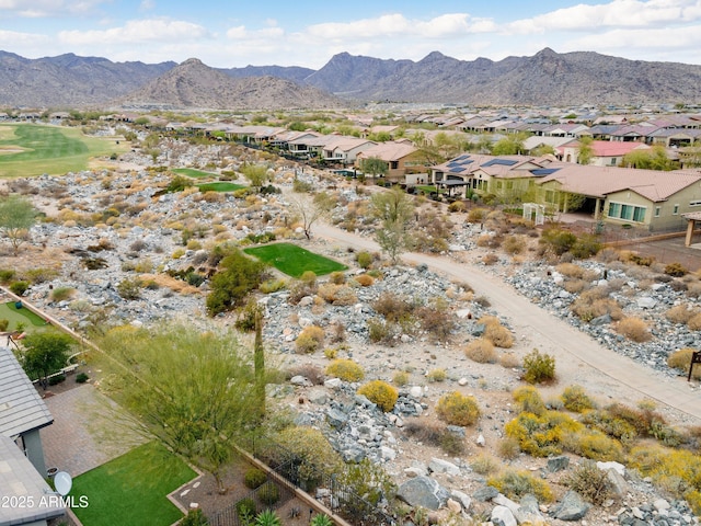 drone / aerial view featuring a mountain view and a residential view