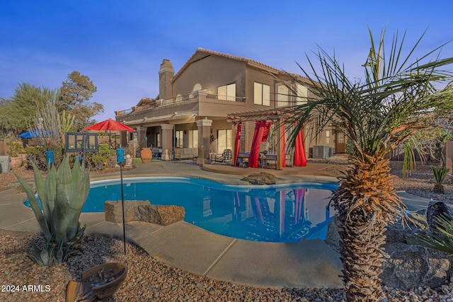 view of pool featuring a patio