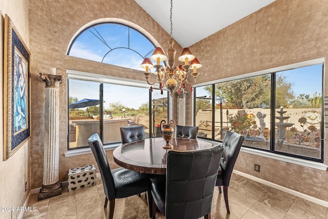 tiled dining room featuring a notable chandelier and high vaulted ceiling