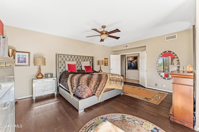 bedroom featuring dark hardwood / wood-style flooring and ceiling fan