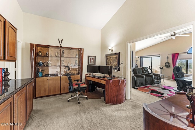 office featuring carpet, ceiling fan, and lofted ceiling