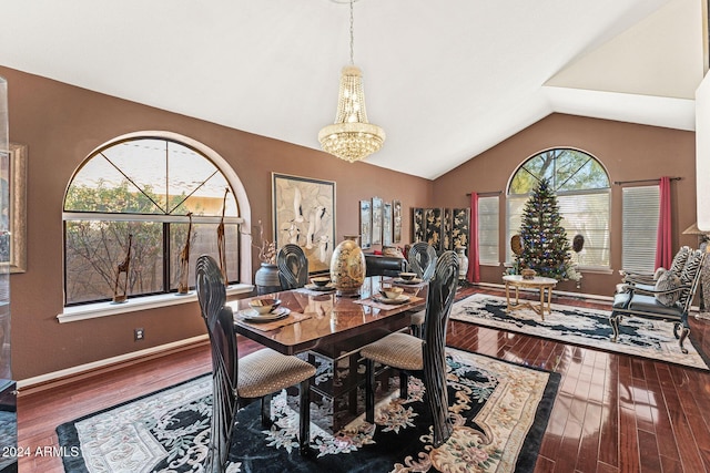 dining space featuring a notable chandelier, lofted ceiling, and wood-type flooring