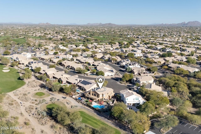 birds eye view of property featuring a mountain view