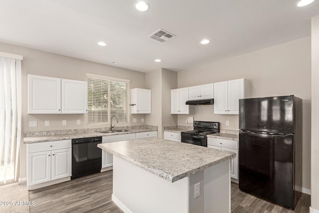 3713 S 54th Ln, Phoenix, AZ 85043 - kitchen featuring black appliances, a sink, under cabinet range hood, white cabinets, and light countertops