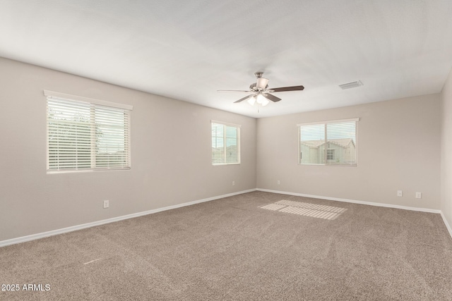 3713 S 54th Ln, Phoenix, AZ 85043 - spare room with carpet floors, ceiling fan, and baseboards