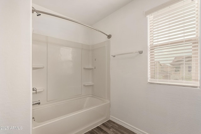 3713 S 54th Ln, Phoenix, AZ 85043 - bathroom with wood finished floors, baseboards, and shower / bathtub combination