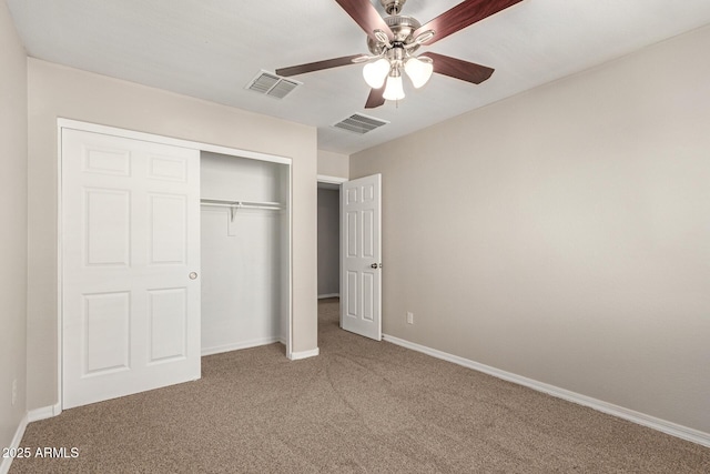 3713 S 54th Ln, Phoenix, AZ 85043 - unfurnished bedroom featuring carpet floors, a closet, baseboards, and a ceiling fan