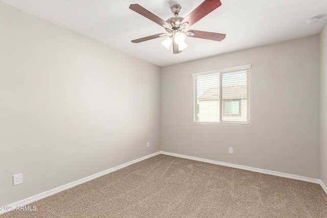 3713 S 54th Ln, Phoenix, AZ 85043 - empty room with carpet floors, baseboards, ceiling fan, and a smoke detector