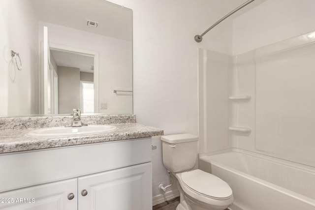 3713 S 54th Ln, Phoenix, AZ 85043 - full bath featuring toilet, vanity, bathtub / shower combination, and baseboards
